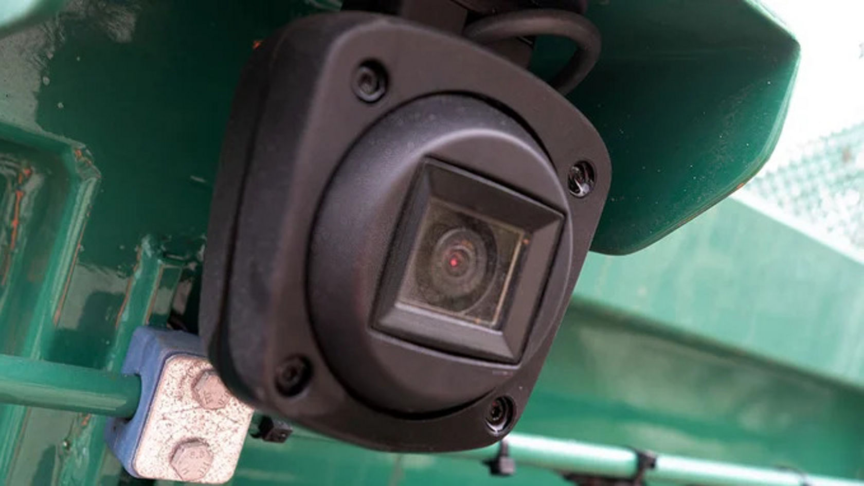 Close-up of a black camera mounted on an Econic.