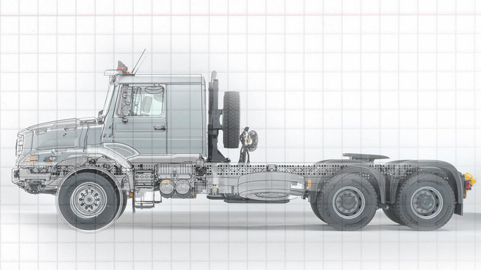 Drawing of the side view of the Zetros. There is a grid above it. The partially transparent components create an X-ray effect.
